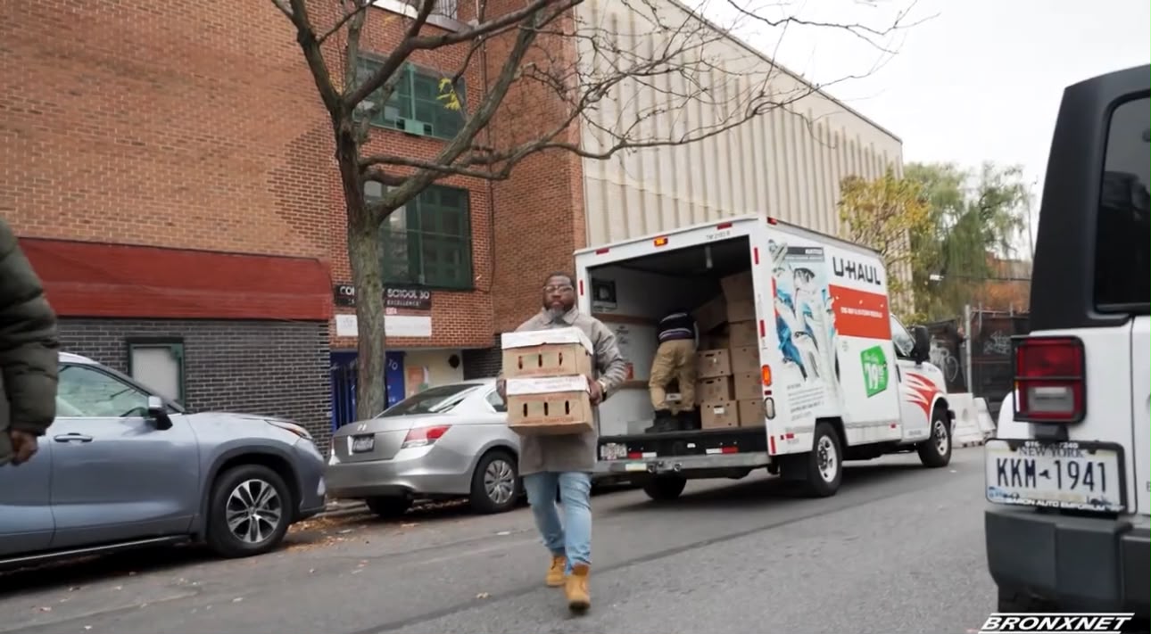 Bishop Singletary Unloading the U-Haul - Holiday Distribution